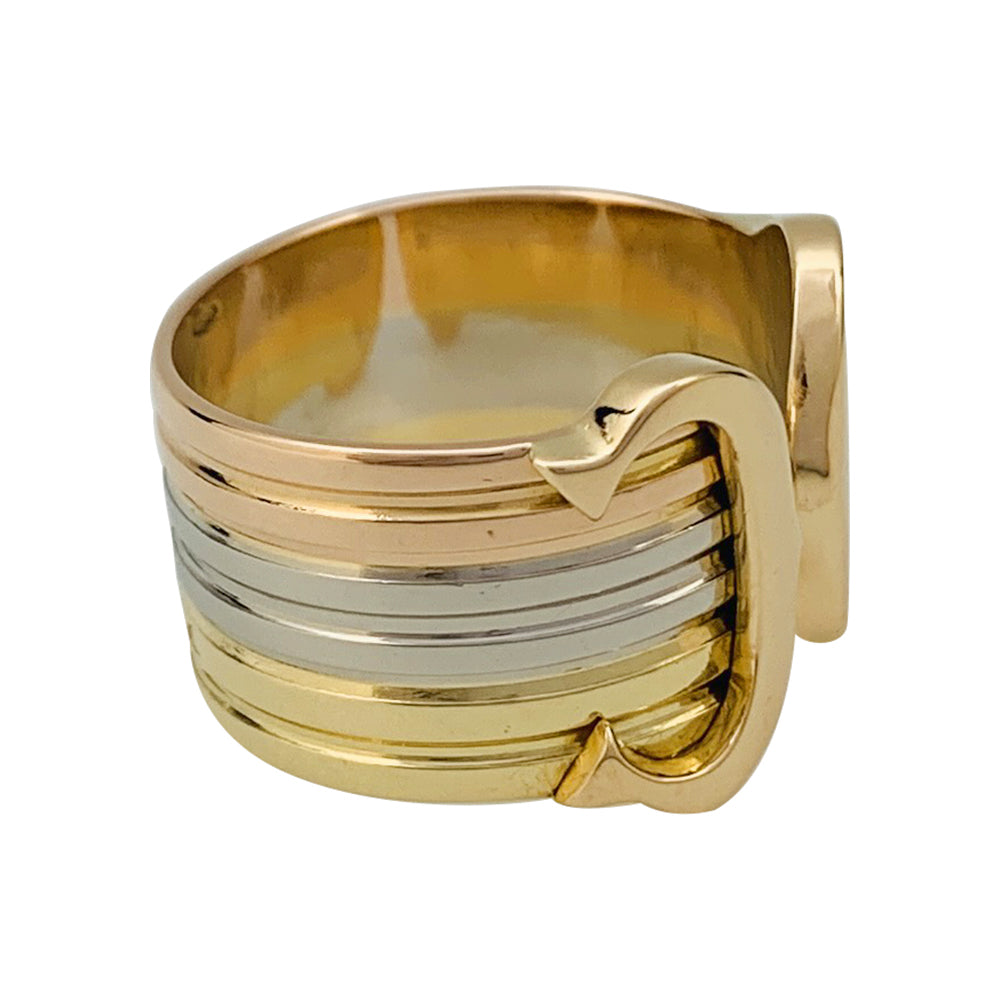 Bague Cartier vintage, "Double C", trois ors.