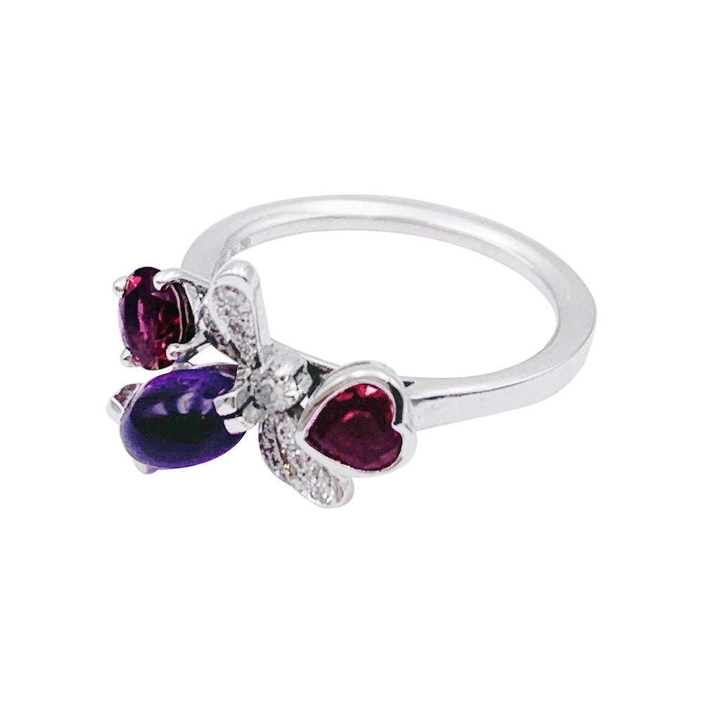 Chaumet ring, "Catch me...if you love me", white gold, amethyst, garnet, diamonds.