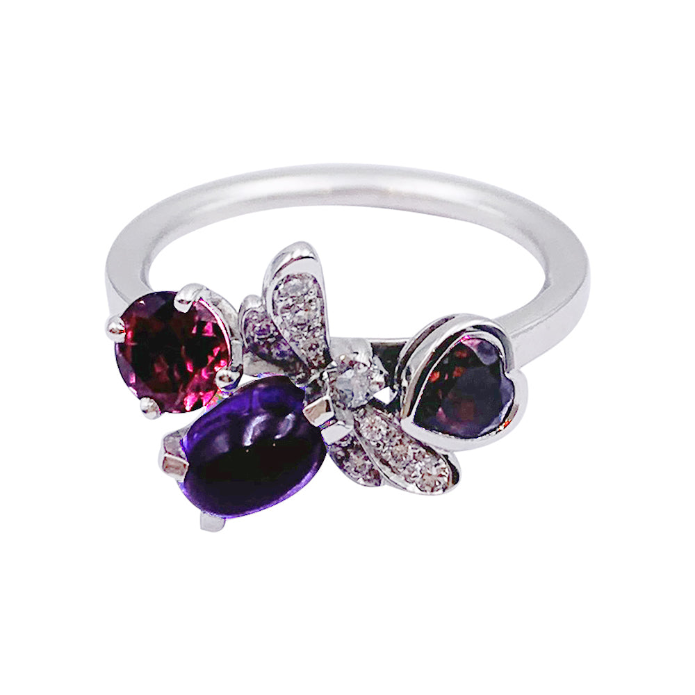 Bague Chaumet, "Attrape-moi...si tu m'aimes", or blanc, améthyste, grenat, diamants.
