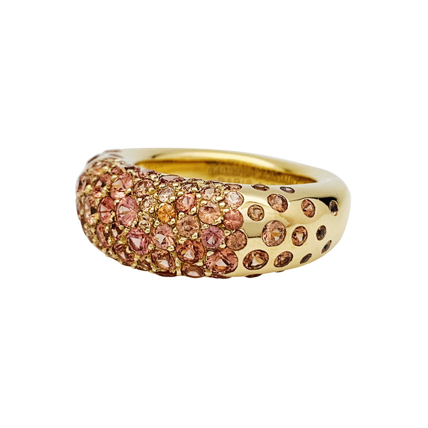 Bague Chaumet modèle "Caviar" en or jaune, saphirs oranges.
