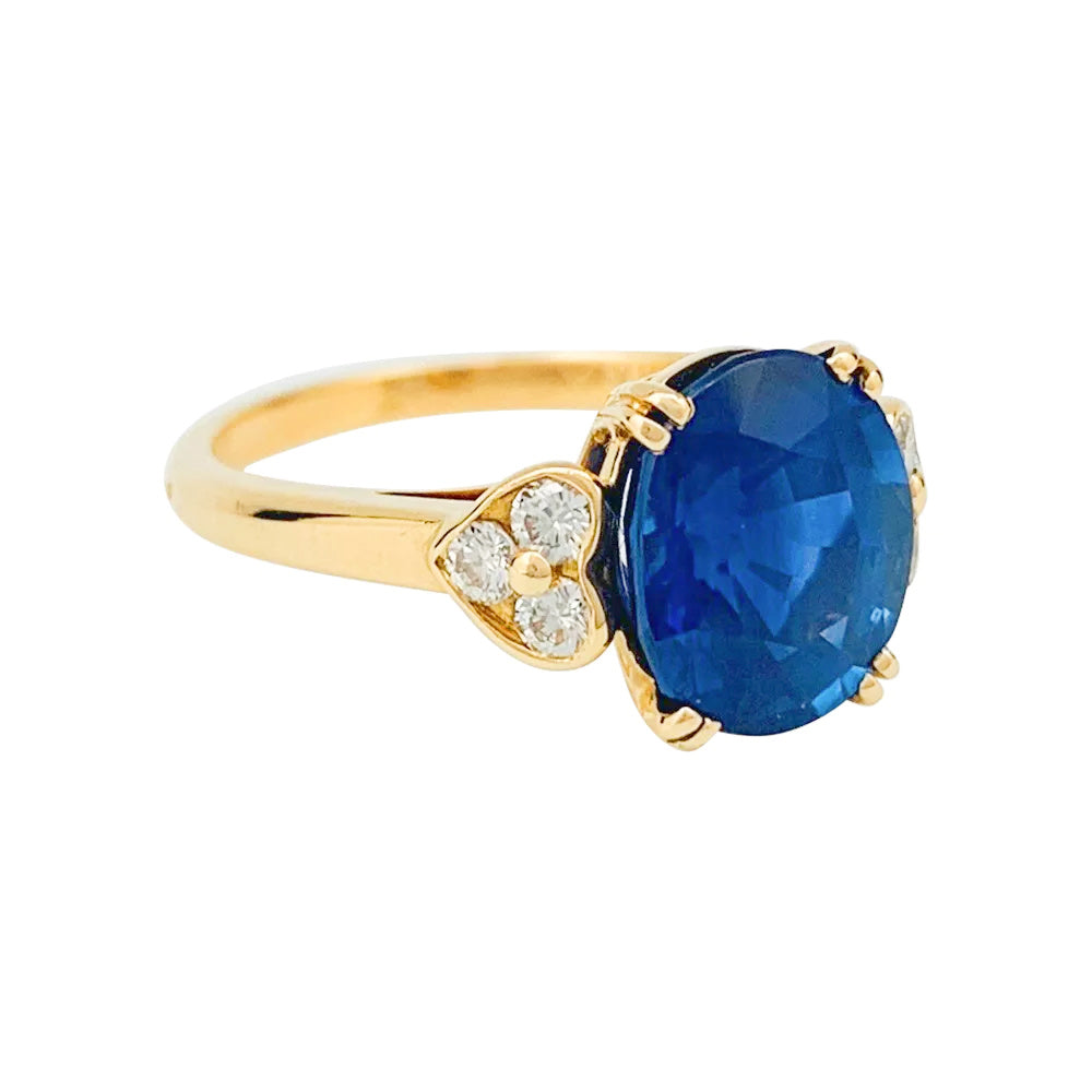 Mauboussin ring, centered with an oval sapphire framed by diamonds.