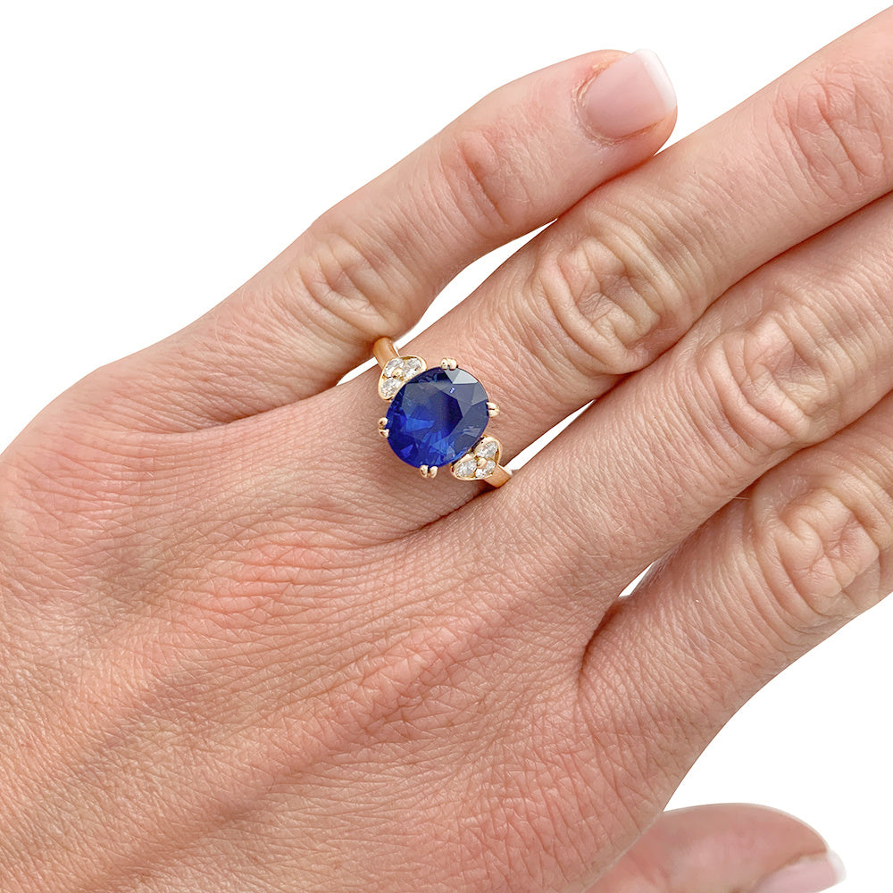 Mauboussin ring, centered with an oval sapphire framed by diamonds.