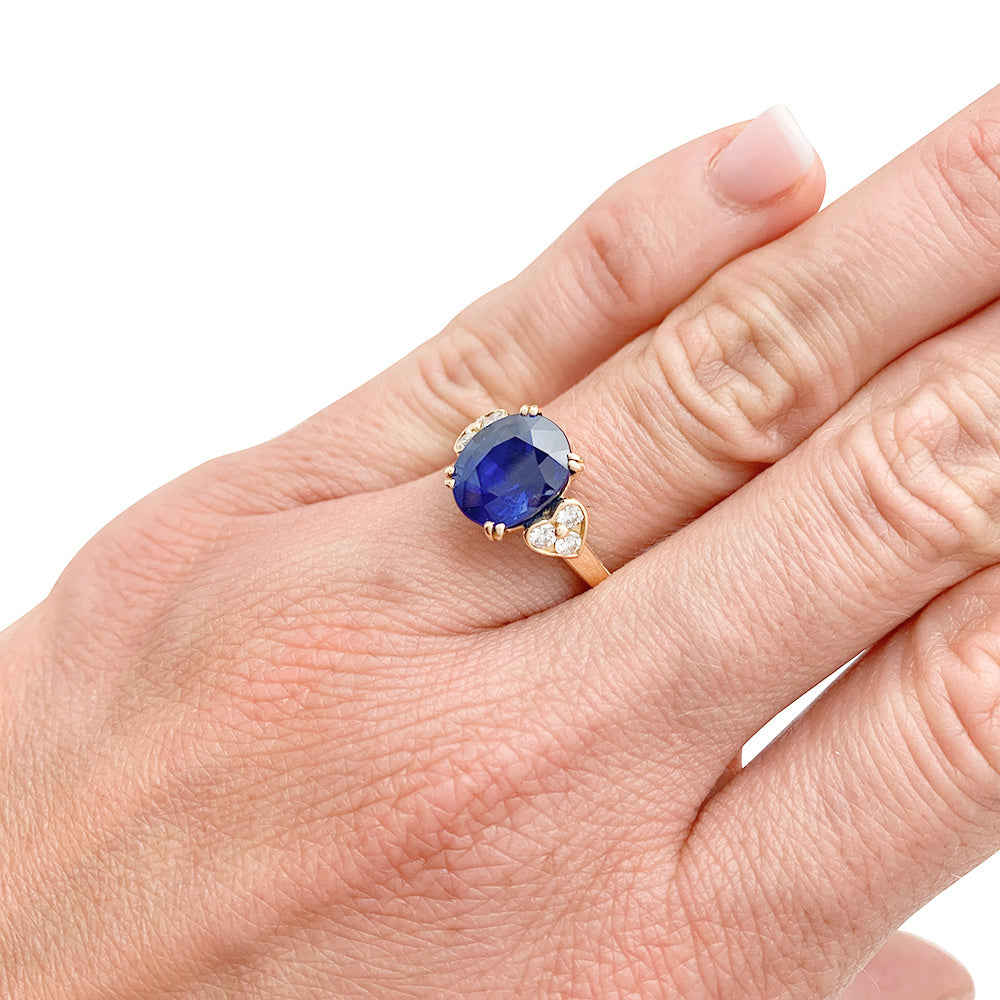 Mauboussin ring, centered with an oval sapphire framed by diamonds.