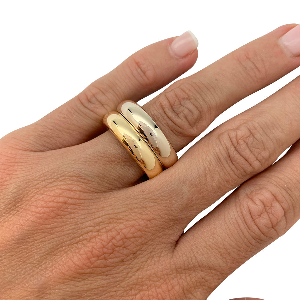 Poiray ring, "Symbol", three golds.