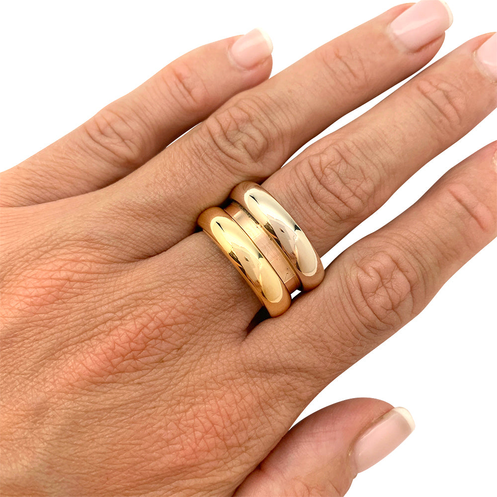 Poiray ring, "Symbol", three golds.