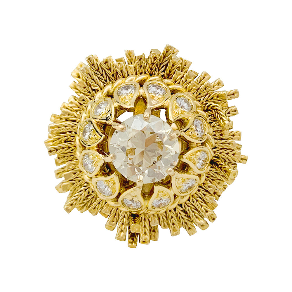 Sterlé ring in yellow gold and diamonds.