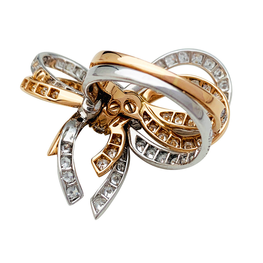 Bague Van Cleef & Arpels, "Double Noeud", or blanc, or rose, diamants.