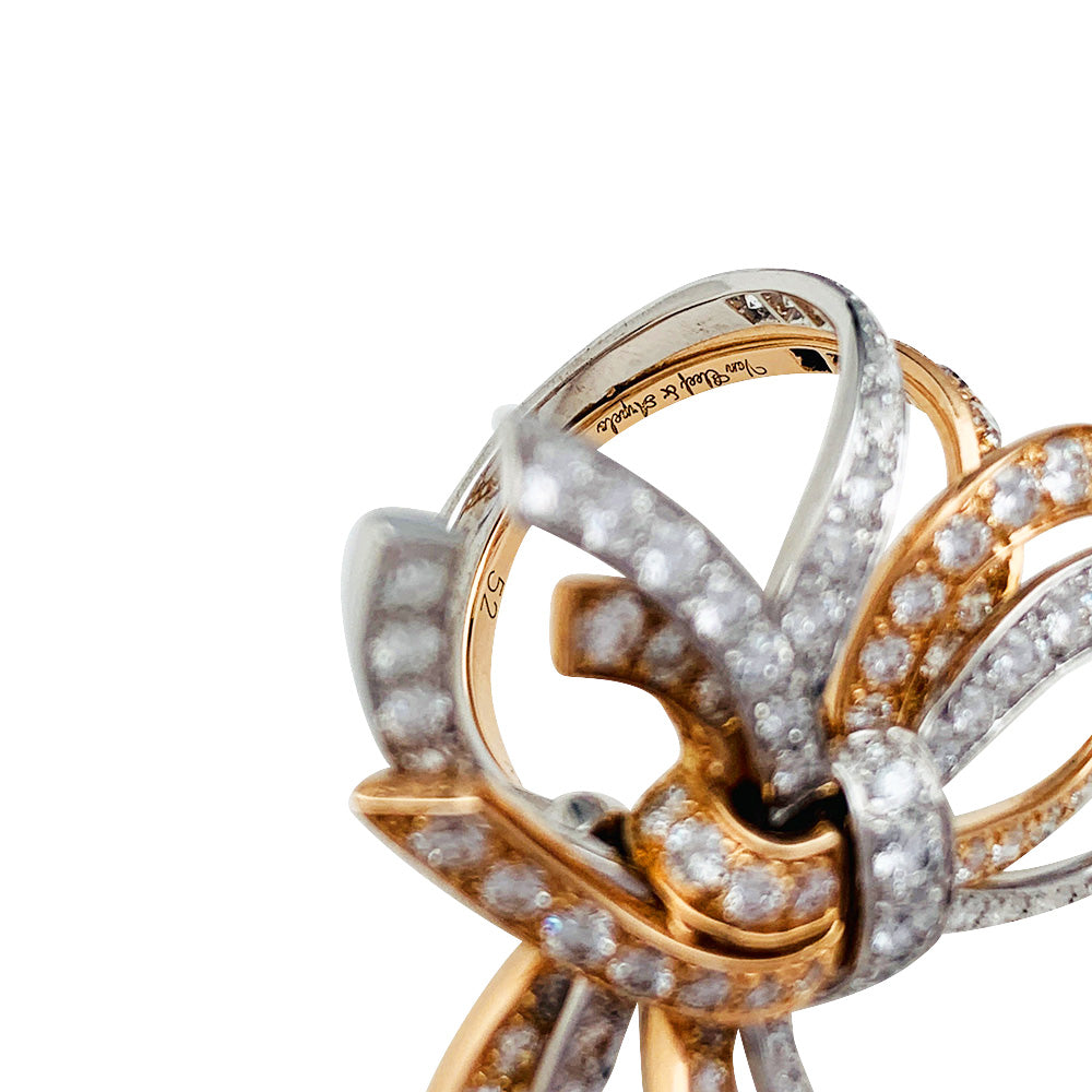 Van Cleef & Arpels ring, "Double Knot", white gold, pink gold, diamonds.