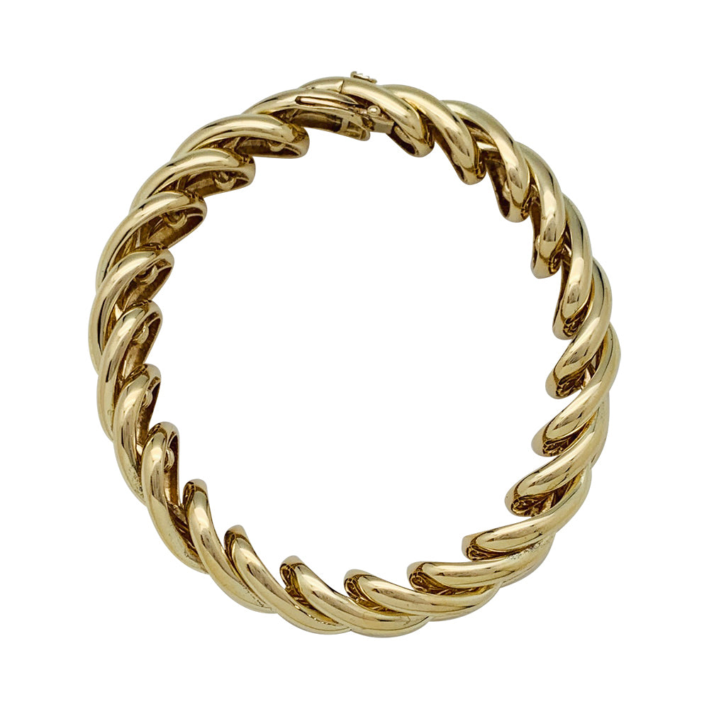 Bracelet Boucheron "Tressé" en or jaune.