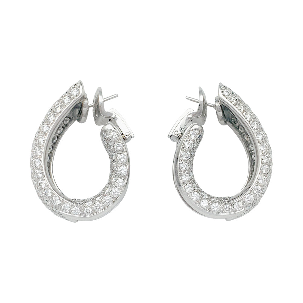 Cartier "Lakarda" earrings set with 11.71 carats of diamonds.