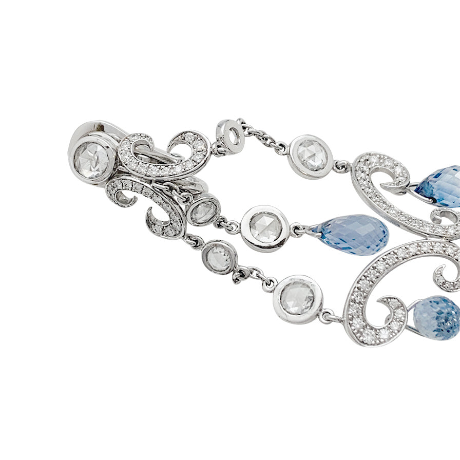 Chopard "Copacabana" earrings in white gold, diamonds, sapphires.