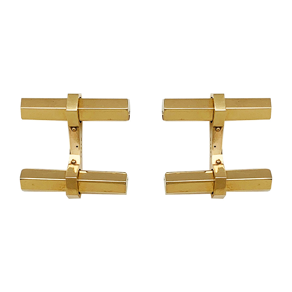 Boutons de manchette Cartier en or jaune, acier, onyx et aventurine.