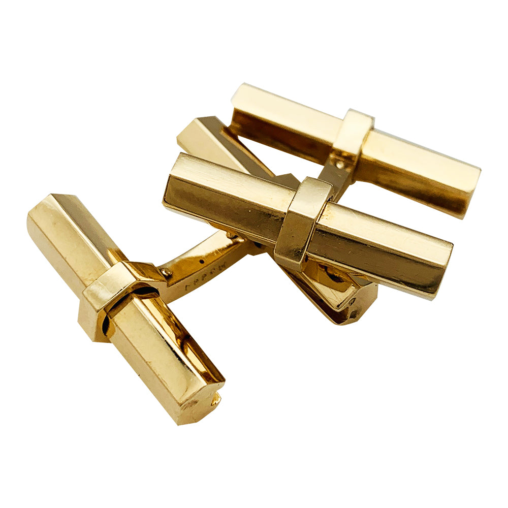 Boutons de manchette Cartier en or jaune, acier, onyx et aventurine.
