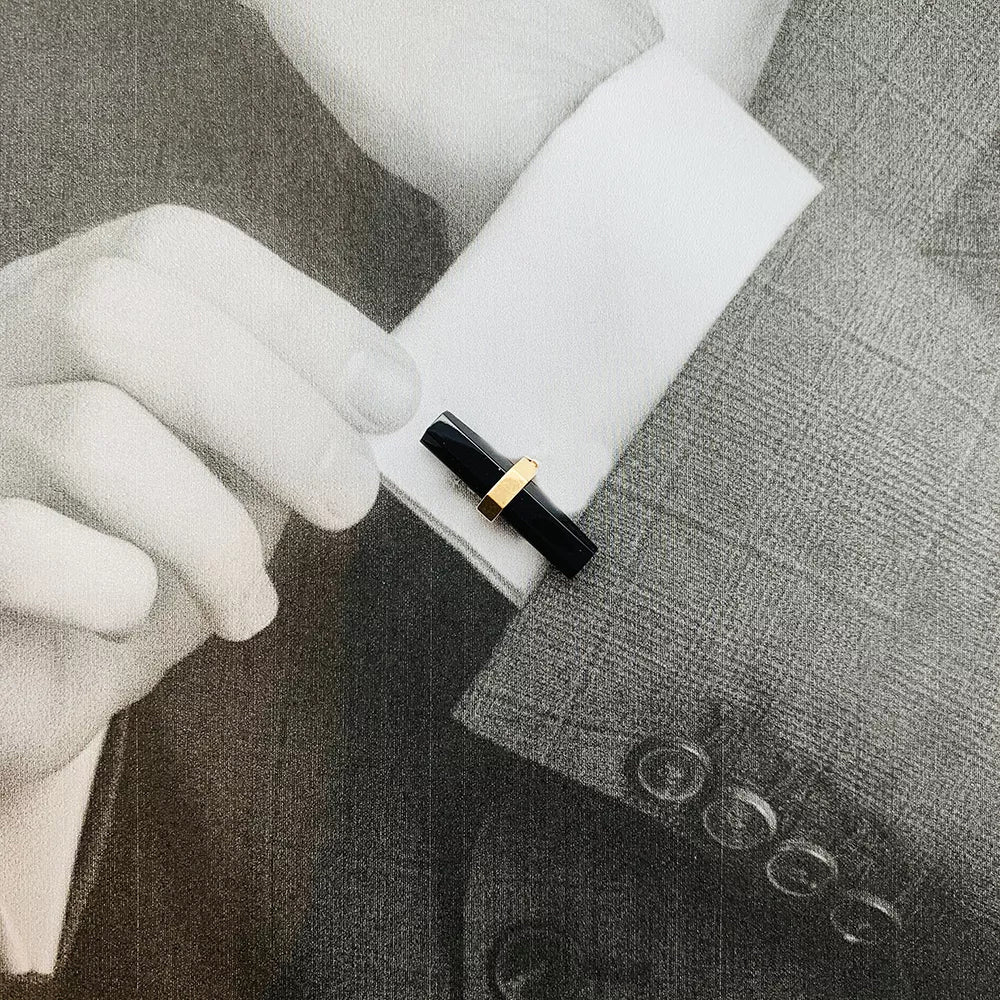 Cartier cufflinks in yellow gold, steel, onyx and aventurine.