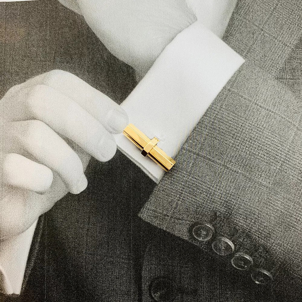 Cartier cufflinks in yellow gold, steel, onyx and aventurine.