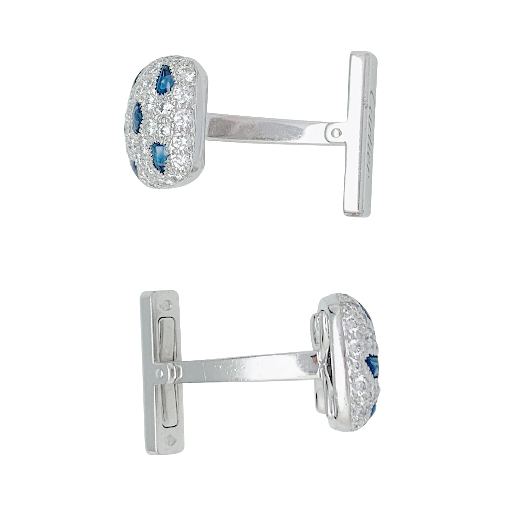 Boutons de manchette Cartier "Panthère" or blanc et diamants.