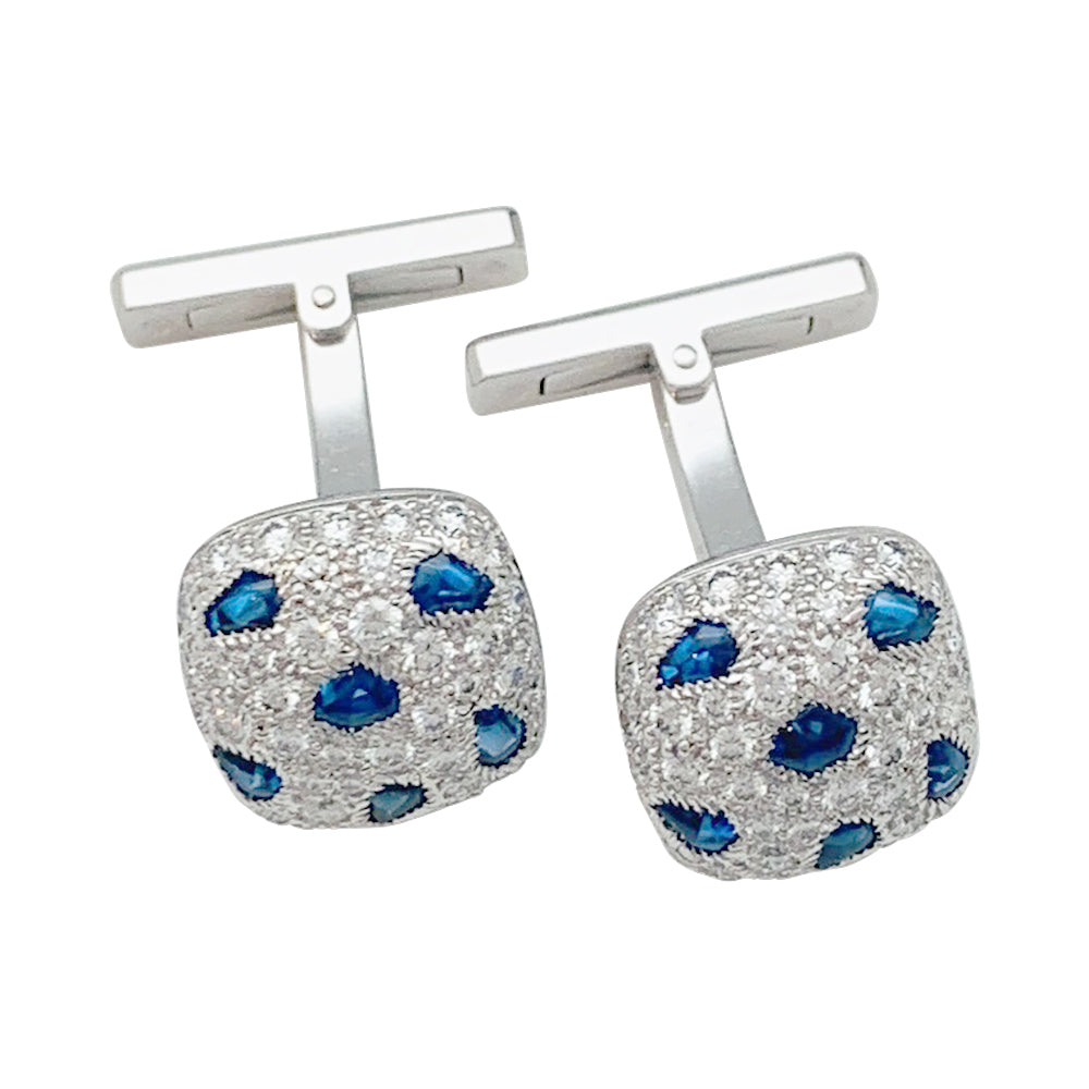 Cartier "Panther" cufflinks in white gold and diamonds.