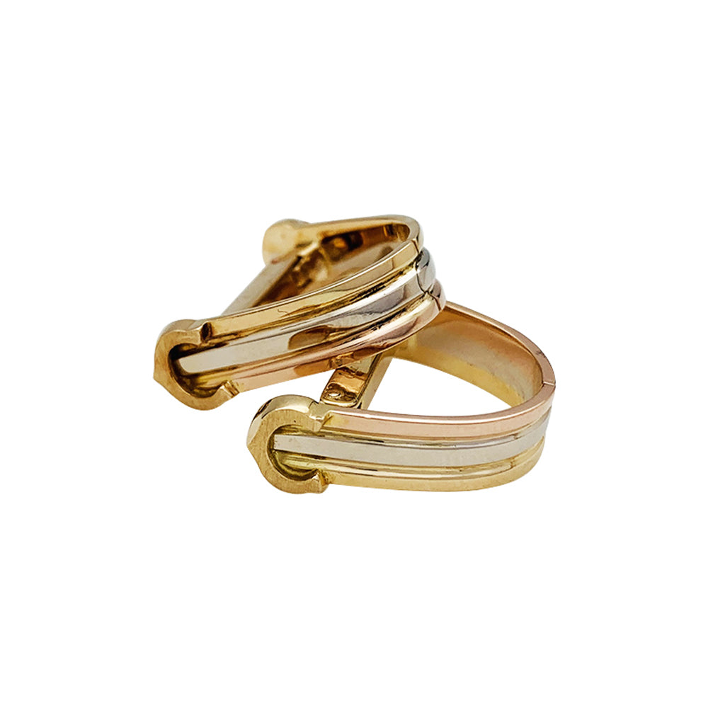 Cartier "Mini Ressort CC" three-tone cufflinks.