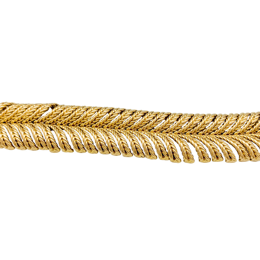 Boucheron "Plume" bracelet in yellow gold.