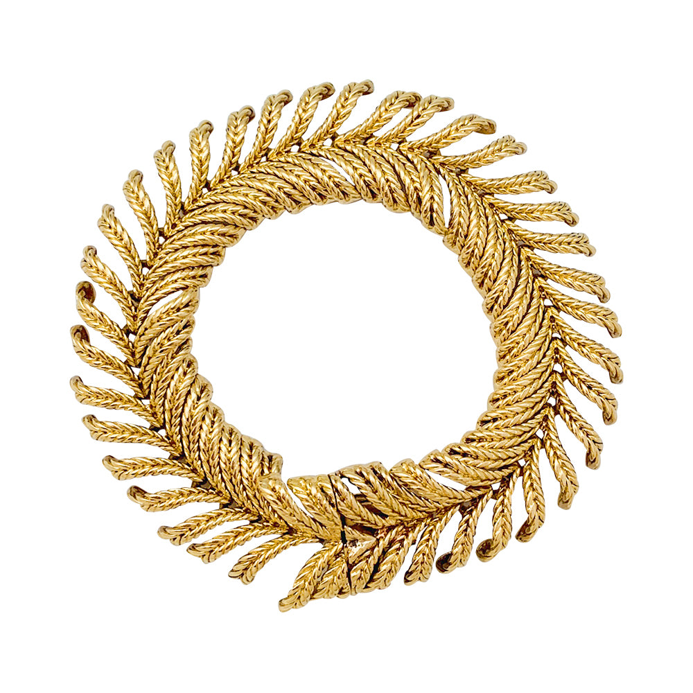 Bracelet Boucheron "Plume" en or jaune.