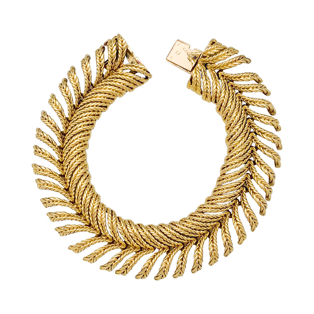 Boucheron "Plume" bracelet in yellow gold.