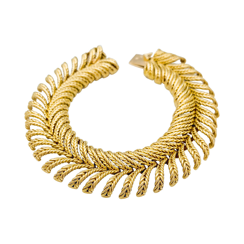 Boucheron "Plume" bracelet in yellow gold.