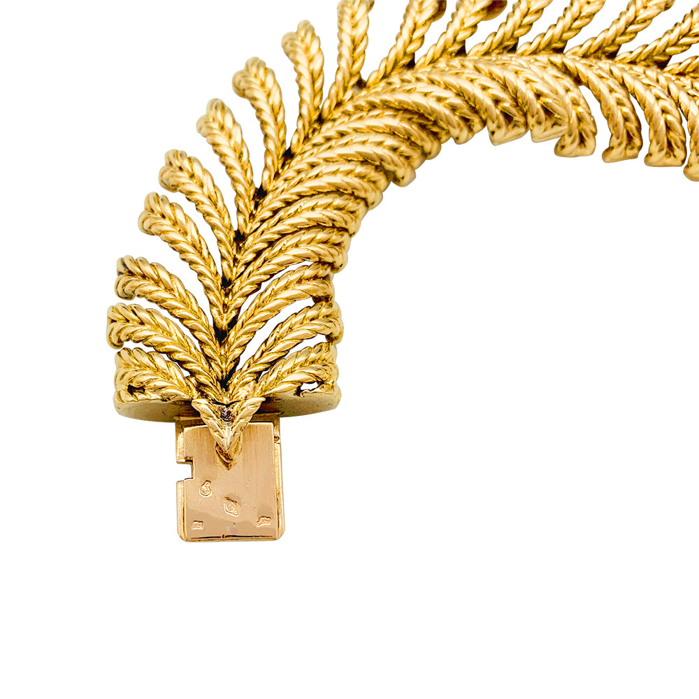 Boucheron "Plume" bracelet in yellow gold.