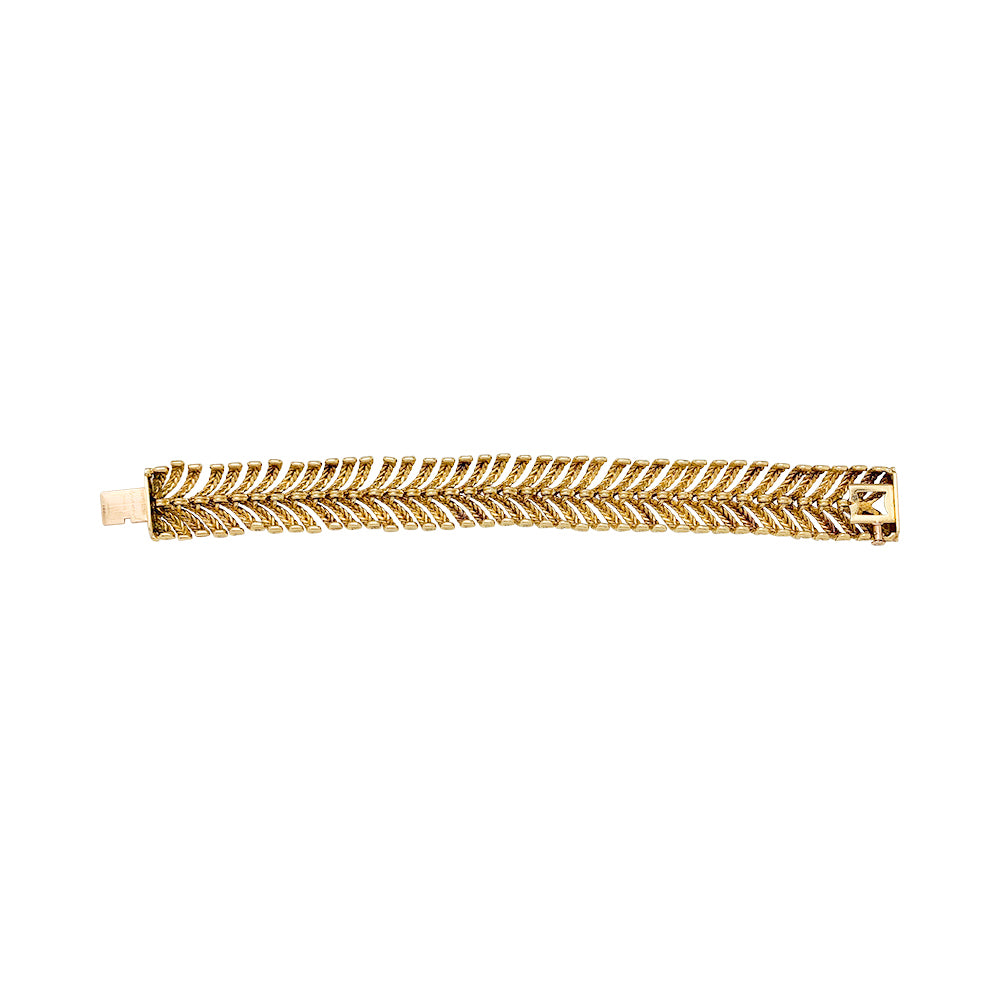 Boucheron "Plume" bracelet in yellow gold.