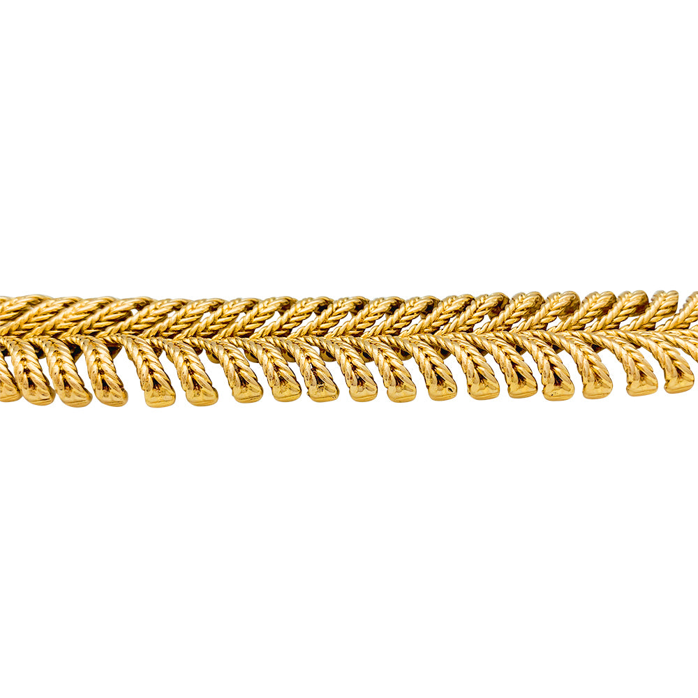 Boucheron "Plume" bracelet in yellow gold.