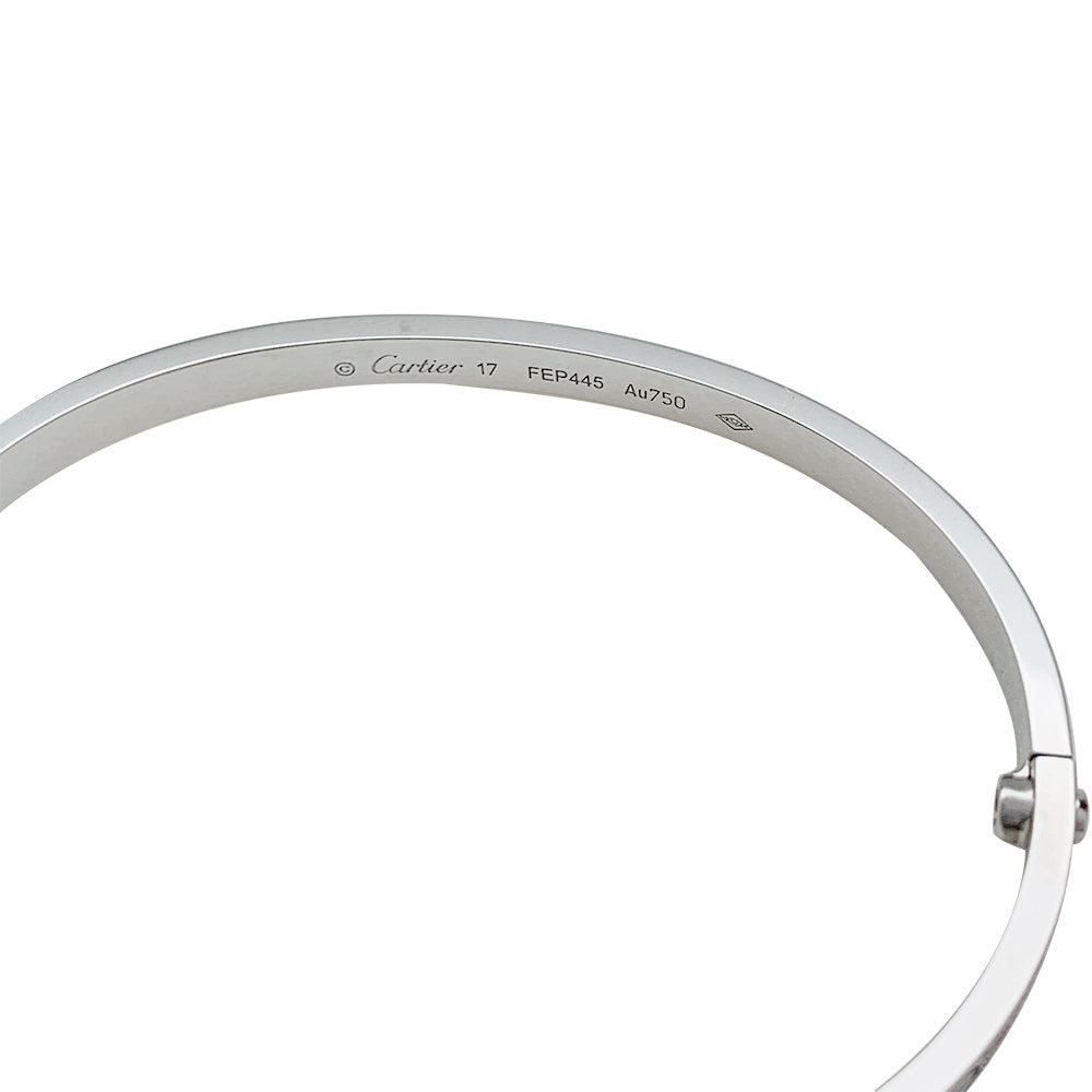 Bracelet Cartier, "Love", or blanc et diamants.