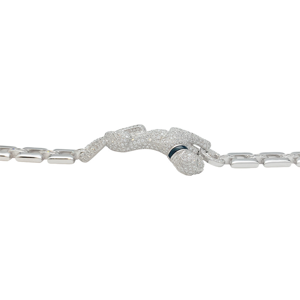 Cartier "Panthère de Cartier" bracelet in white gold, diamonds, emerald and onyx.
