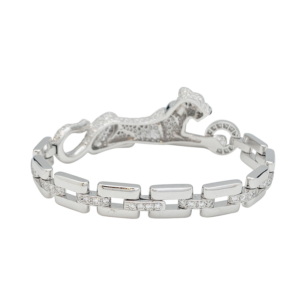 Cartier "Panthère de Cartier" bracelet in white gold, diamonds, emerald and onyx.