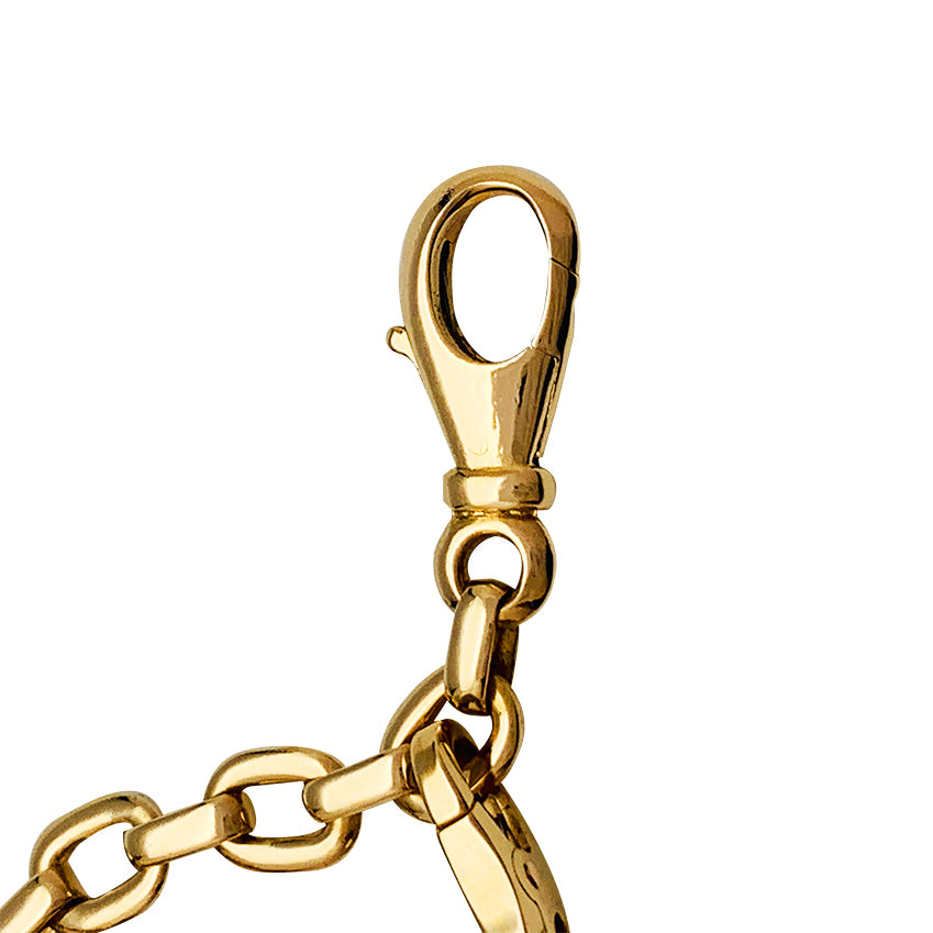 Cartier bracelet in yellow gold, 5 charms, diamonds, emeralds and rubies.