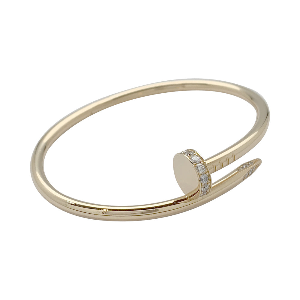 Cartier bracelet, "Just a nail", yellow gold, diamonds.