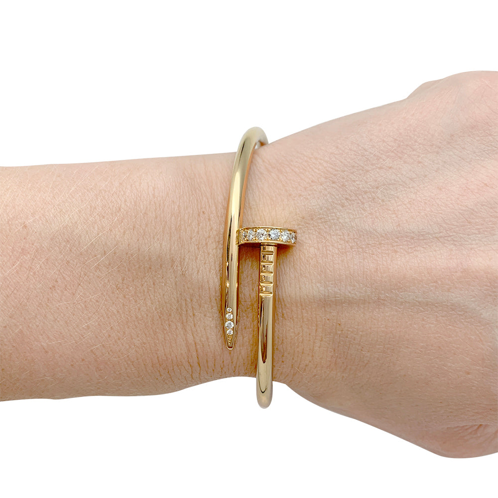 Cartier bracelet, "Just a nail", yellow gold, diamonds.
