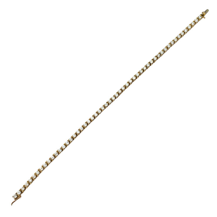 Cartier line bracelet in yellow gold set with diamonds.