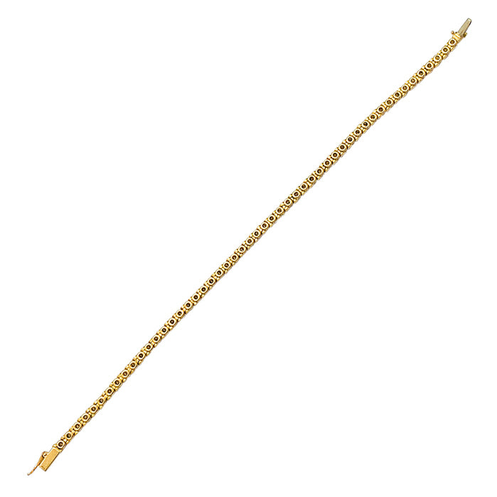 Bracelet Cartier ligne en or jaune serti de diamants.