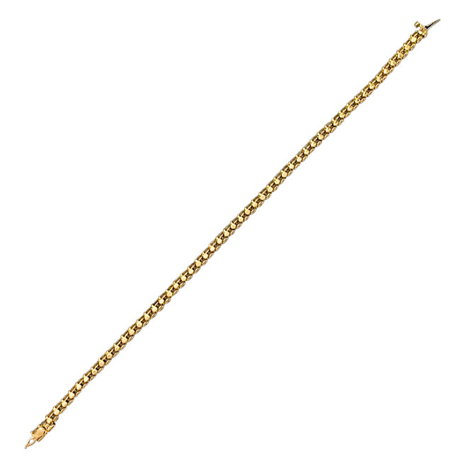 Cartier line bracelet in yellow gold set with diamonds.