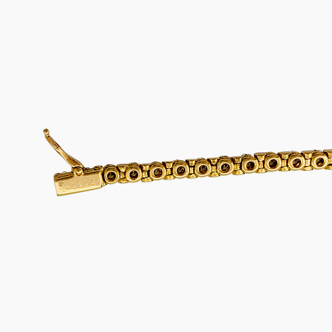 Cartier line bracelet in yellow gold set with diamonds.