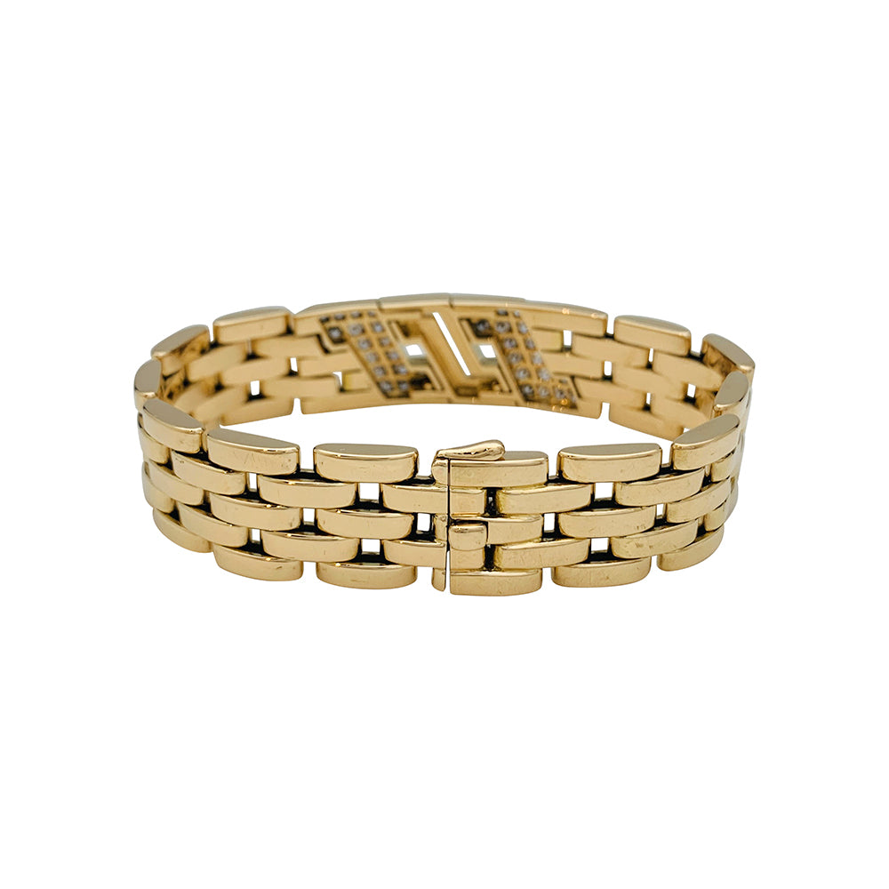 Cartier panther mesh bracelet in yellow gold and diamonds.