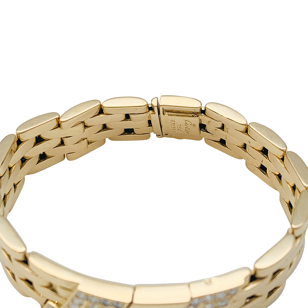Cartier panther mesh bracelet in yellow gold and diamonds.