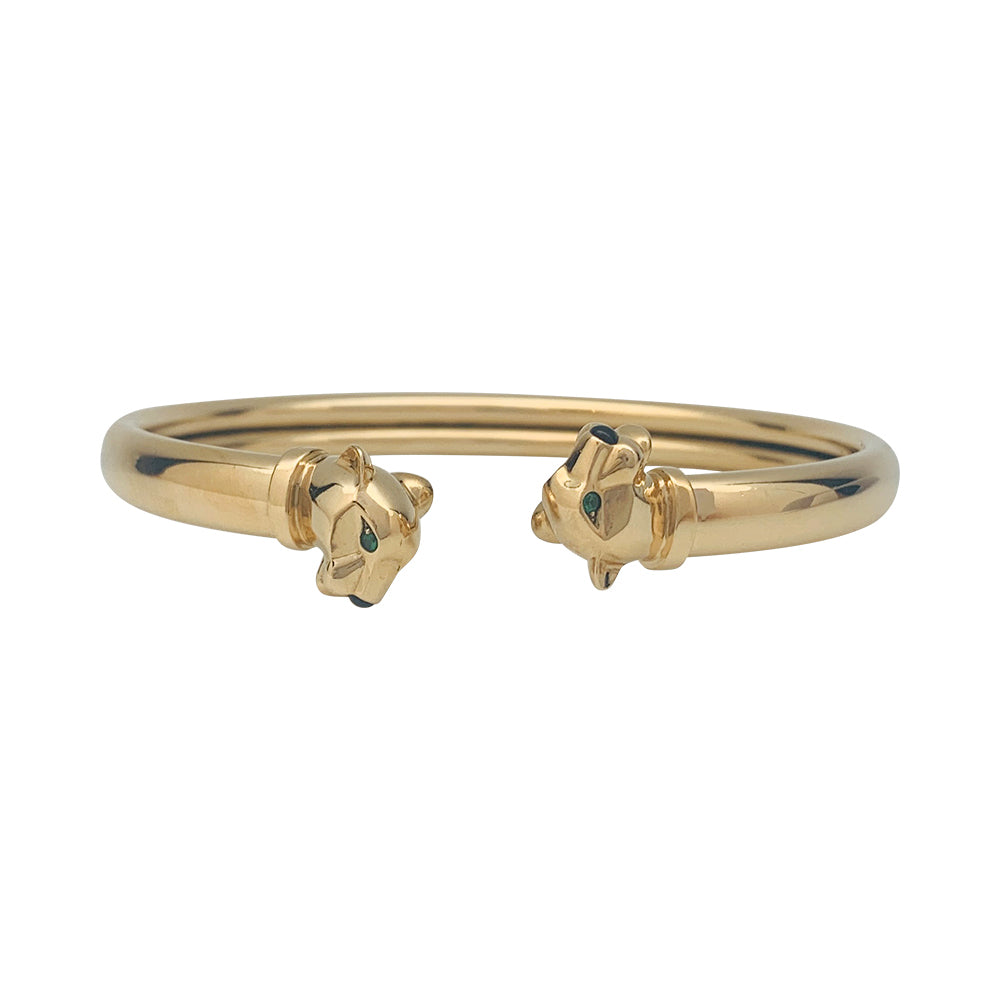 Bracelet Cartier "Panthère" en or jaune, tsavorites et onyx.