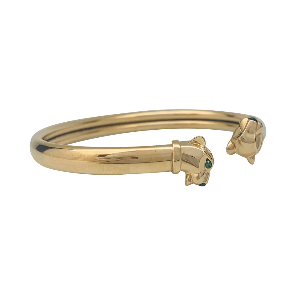 Cartier "Panthère" bracelet in yellow gold, tsavorites and onyx.