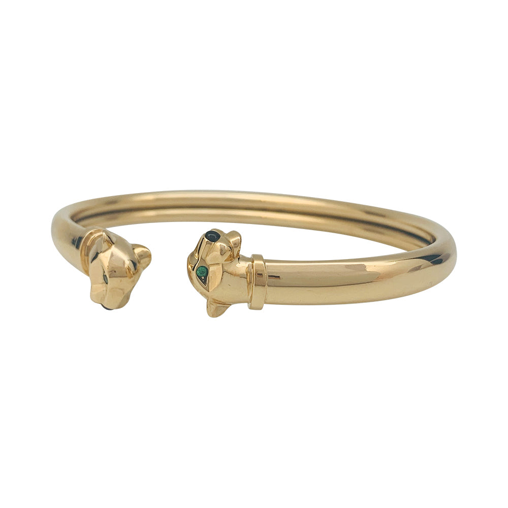 Bracelet Cartier "Panthère" en or jaune, tsavorites et onyx.