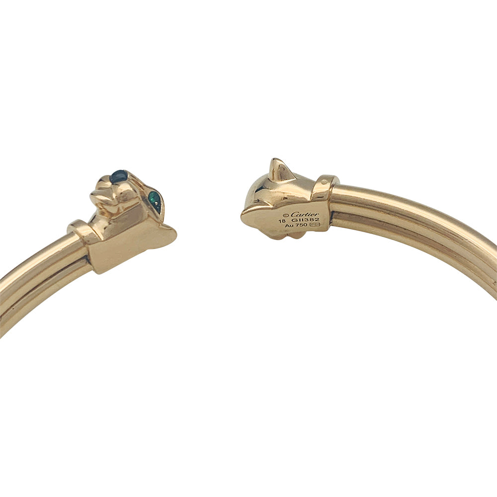 Cartier "Panthère" bracelet in yellow gold, tsavorites and onyx.