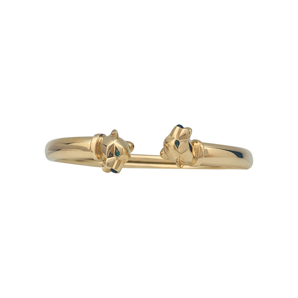 Cartier "Panthère" bracelet in yellow gold, tsavorites and onyx.