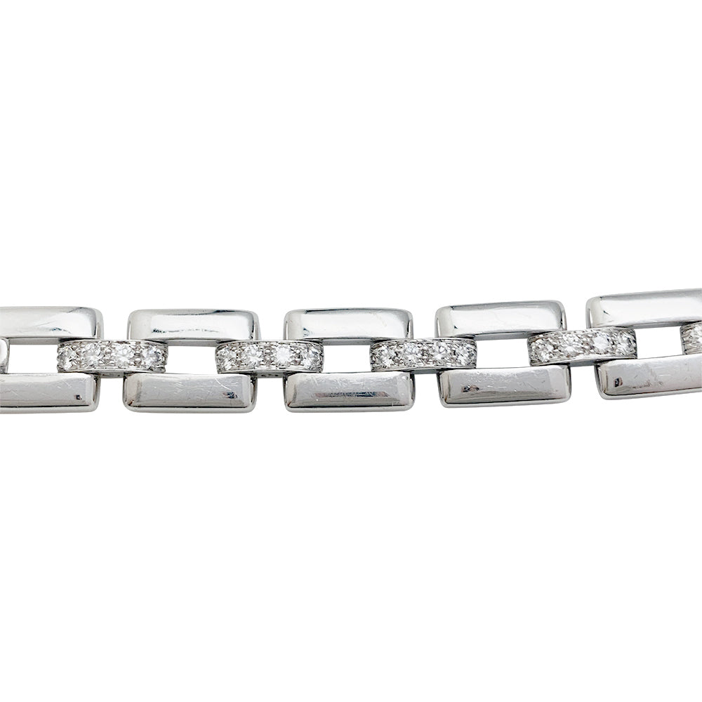 Cartier "Panthère de Cartier" bracelet in white gold, diamonds, emerald and onyx.