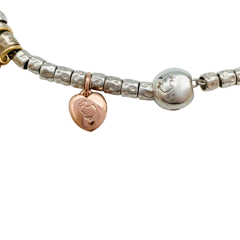 Bracelet breloques Dodo, argent et or.