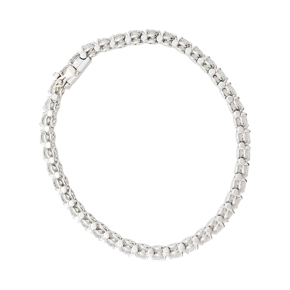 Cartier, "Lignes Essentielles" bracelet, in platinum set with diamonds.