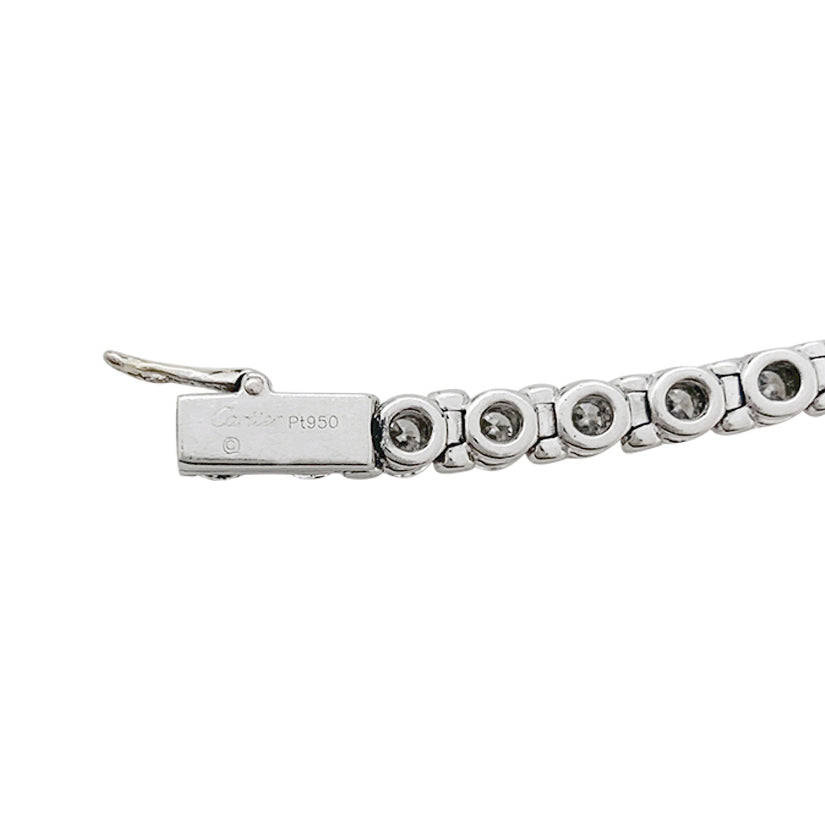 Cartier, "Lignes Essentielles" bracelet, in platinum set with diamonds.